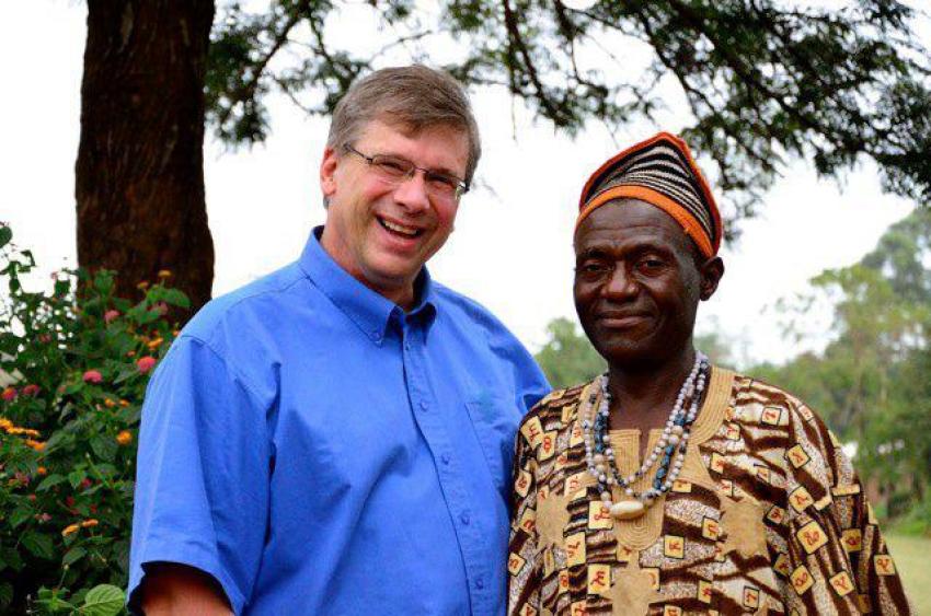 Bible translator Angus Fung (R) poses for a photo with Tearfund Canada President Wayne Johnson (L) in Wum, Cameroon.
