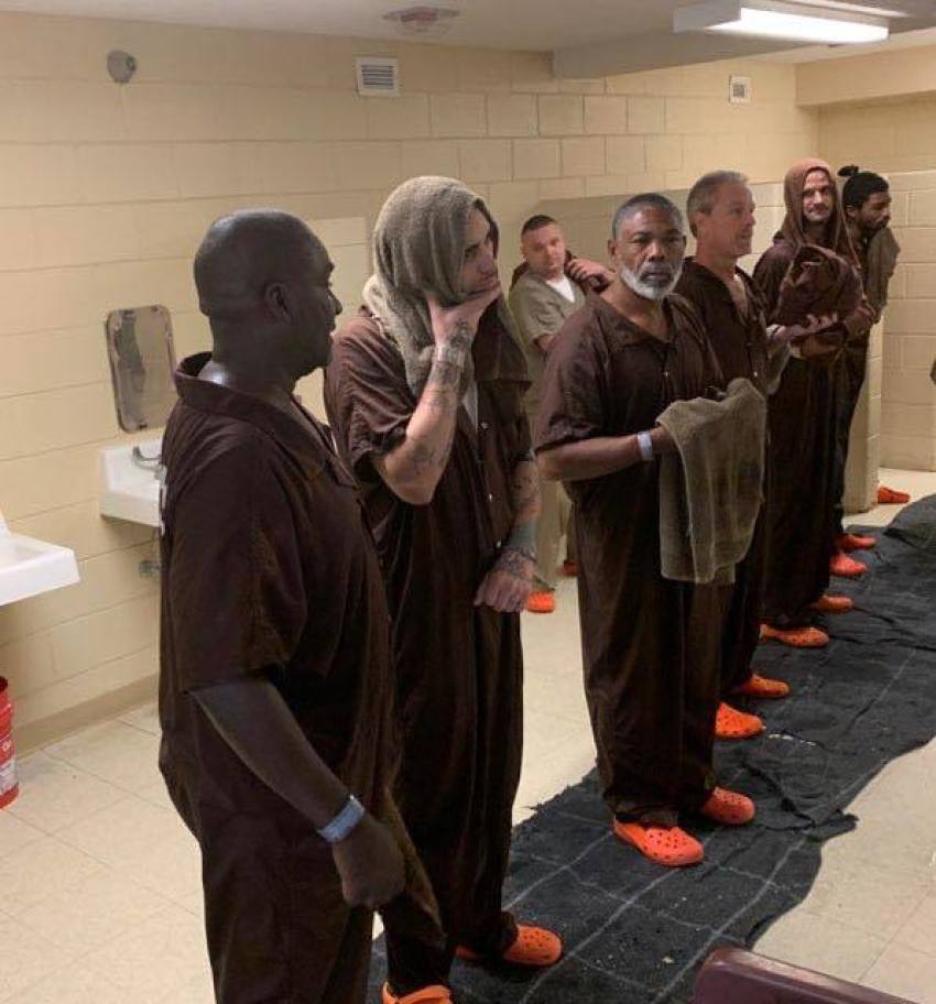 18 inmates were baptized Sunday at the W. Glenn Campbell Detention Center.