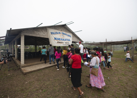 People enter their first church in La Laguna, Mexico, on Oct. 22, 2019.