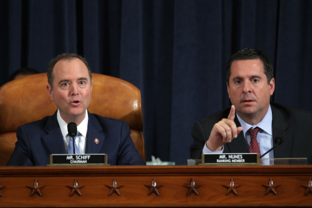 Committee Chairman Rep. Adam Schiff, D-Calif., (L) declines ranking member Rep. Devin Nunes,' R-Calif., attempt to yield his time to another committee member during a hearing in which former U.S. Ambassador to Ukraine Marie Yovanovitch testifies before the House Intelligence Committee in the Longworth House Office Building on Capitol Hill November 15, 2019, in Washington, D.C.
