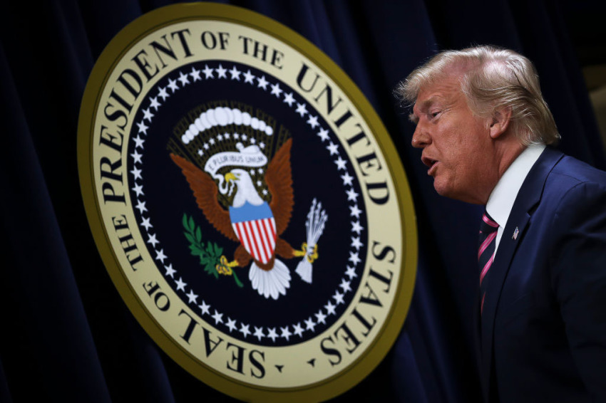U.S. President Donald Trump exits after speaking at a White House Mental Health Summit in the South Court Auditorium of the Eisenhower Executive Office Building at the White House on December 19, 2019, in Washington, D.C.