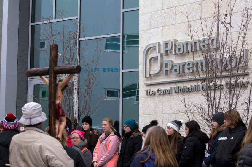 Demonstrators gather during a protest vigil sponsored by The Christian Defense Coalition and Priests for Life outside of the Planned Parenthood of Metropolitan Washington, D.C., Carol Whitehill Moses Center on January 17, 2019 in Washington, D.C.
