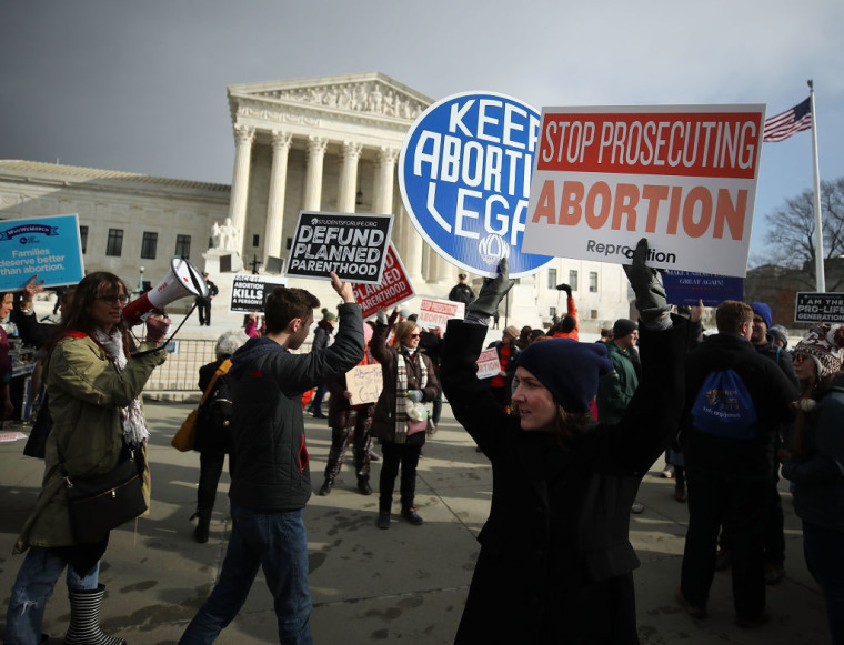 Protesters on both sides of the abortion issue gather in front of the U.S. Supreme Court building during the Right To Life March, on January 18, 2019, in Washington, D.C. The Right to Life Campaign held its annual March For Life rally and march to the U.S. Supreme Court protesting the high court's 1973 Roe v. Wade decision making abortion legal. | Mark Wilson/Getty Images