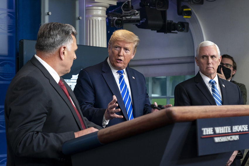 President Donald J. Trump, joined by Vice President Mike Pence, listens as William N. Bryan, science and technology advisor to the DHS Secretary, delivers remarks and answers questions from members of the press during a coronavirus task force briefing Thursday, April 23, 2020, in the James S. Brady White House Press Briefing Room.