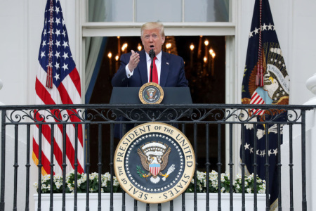 U.S. President Donald Trump speaks from the Truman Balcony during a Rolling to Remember Ceremony: Honoring Our Nation’s Veterans and POW/MIA at the White House May 22, 2020, in Washington, DC. President Trump hosted the event to honor America’s veterans and fallen heroes.