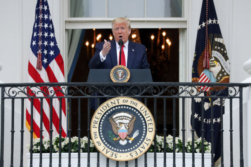 U.S. President Donald Trump speaks from the Truman Balcony during a Rolling to Remember Ceremony: Honoring Our Nation’s Veterans and POW/MIA at the White House May 22, 2020, in Washington, DC. President Trump hosted the event to honor America’s veterans and fallen heroes.