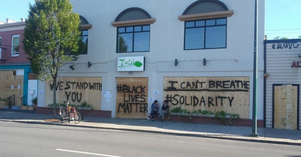 A restaurant in Richmond, Virginia boarded up and spray-painted in preparation for protests against police brutality and racism. Photo taken June 1, 2020.
