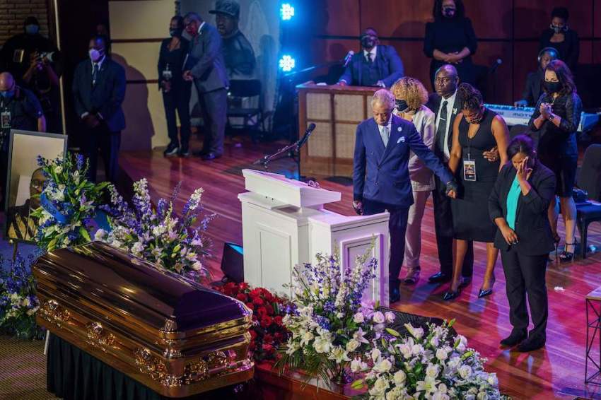 US civil rights leader Al Sharpton (C) reacts as he attends a memorial service in honor of George Floyd on June 4, 2020, at North Central University's Frank J. Lindquist Sanctuary in Minneapolis, Minnesota.