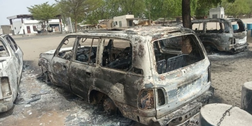 The remains of burned out cars sit in front of the United Nations humanitarian hub in Monguno, Nigeria after an attack claimed by the Islamic State West Africa Province was carried out on June 13, 2020.