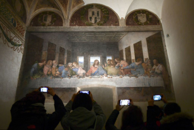 Visitors with their mobile phone take photos of