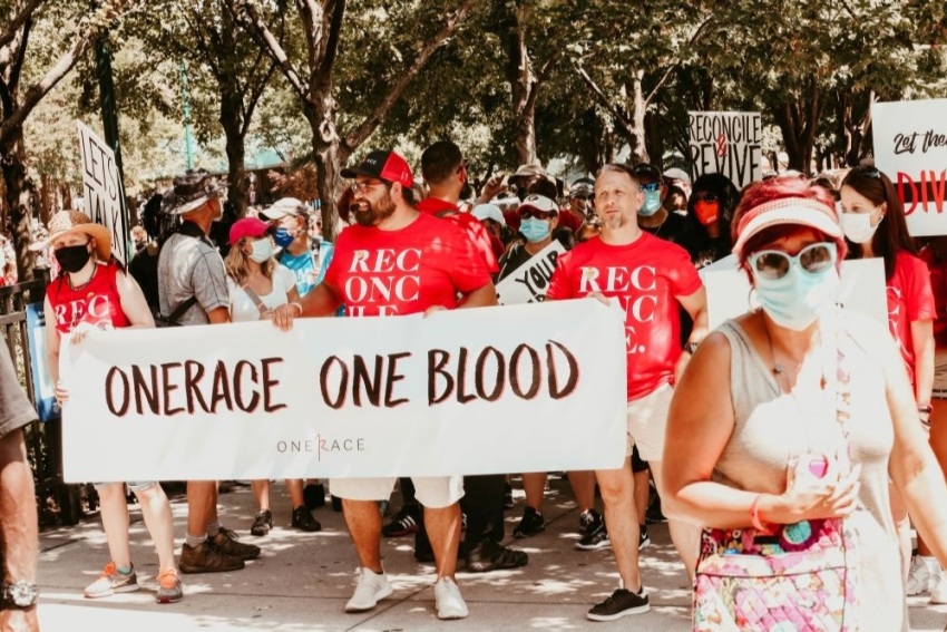 Participants take part in the "March on Atlanta" organized by OneRace Movement in Atlanta, Georgia, on June 19, 2020.