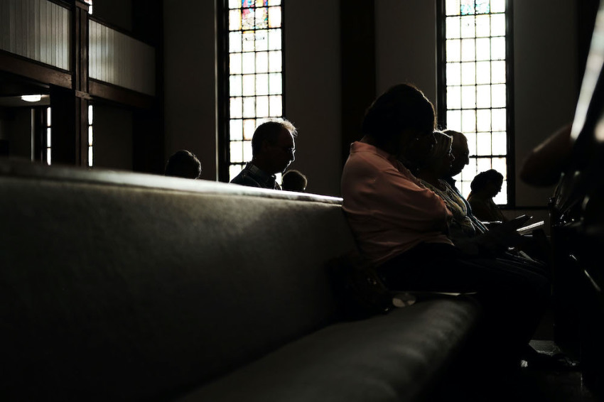 Knoxville residents participate in a service of prayers and hymns for peace in advance of a planned white supremacist rally and counter-protest around a Confederate memorial monument on August 25, 2017 in Knoxville, Tennessee. People congregated at the Second United Methodist Church, one of two churches holding prayer services, to sing, pray and light candles for peace and racial harmony.