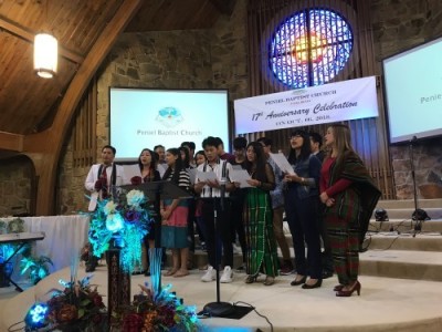 Burmese Christian singing in Tulsa church