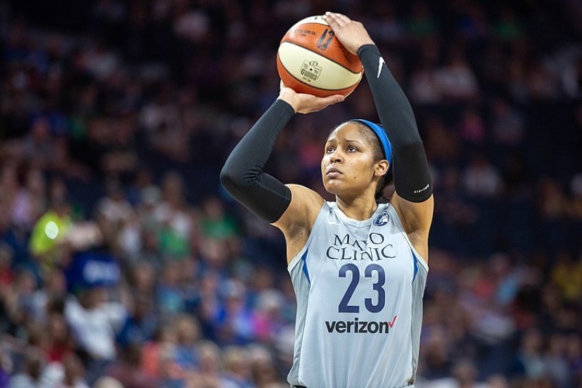 Minnesota Lynx player Maya Moore shoots a foul shot in a game against the Atlanta Dream in June 2018.