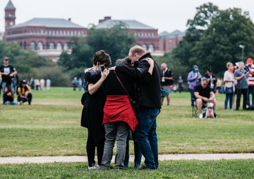 Marchers pray on the National Mall at the Washington Prayer March 2020 lead by Evangelist Franklin Graham on September 26, 2020, in Washington, D.C. The congregation stopped and prayed over various sites throughout downtown Washington.