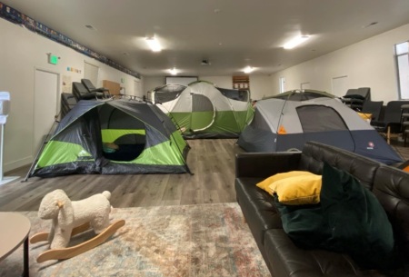 Tents are set up inside Santa Cruz Baptist Church in Aptos, California on Aug. 20, 2020. The church served as a shelter for as many as 40 evacuees of wildfires.