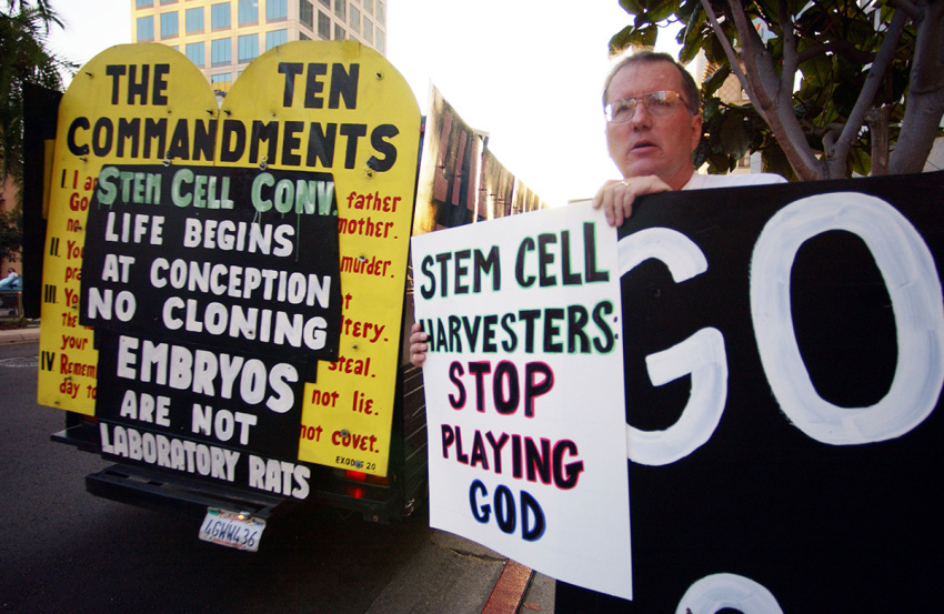 Protesters demonstrating on behalf of the anti-abortion California Life Coalition that opposes all embryonic stem cell research outside the Stem Cells and Regenerative Medicine: Commercial Implications for the Pharmaceutical and Biotech Industries meeting October 8, 2002, in San Diego, California.