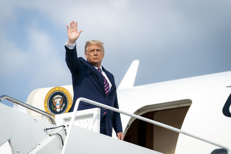 Former President Donald J. Trump disembarks Marine One at Joint Base Andrews, Md. Friday, Sept. 18, 2020, and is escorted to Air Force One by U.S. Air Force personnel.