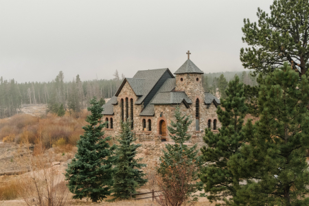 St. Catherine of Siena Chapel, also called the Chapel-on-the-Rock, is located about 20 minutes from Estes Park, Colorado.