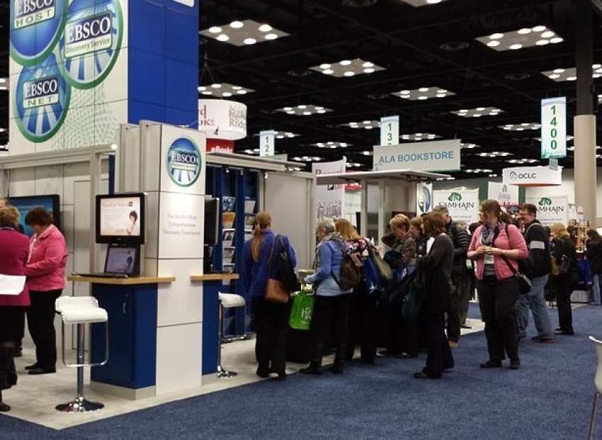 People gather around the EBSCO booth at the 2014 Public Library Association Conference in Indianapolis, Indiana.