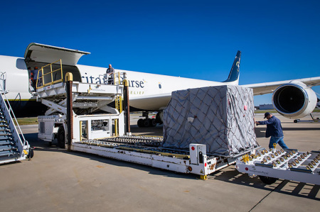 DC-8 aircraft being loaded with winter relief supplies for families in need in Yerevan, Armenia.