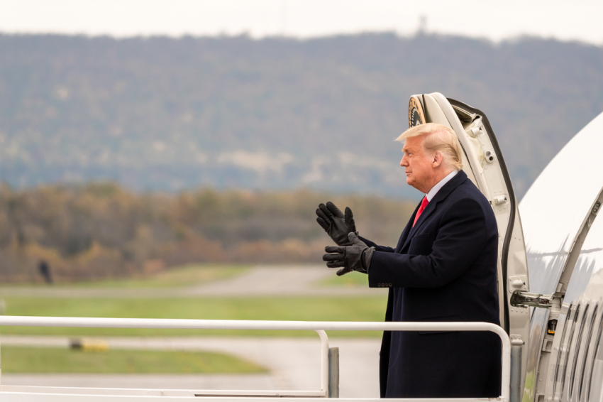 President Donald J. Trump applauds the crowd and gestures with a fist pump as he disembarks Air Force One Saturday, Oct. 31, 2020, upon his arrival to Reading Regional Airport in Reading, Pa., the second of President Trump’s 4 stops in Pennsylvania.