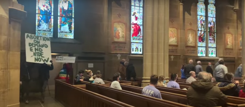 Pro-abortion protesters disrupt a pro-life mass at St. Joseph Cathedral in Columbus, Ohio Friday as Catholics gathered on the 48th anniversary of the Roe v. Wade Supreme Court decision that legalized abortion nationwide.