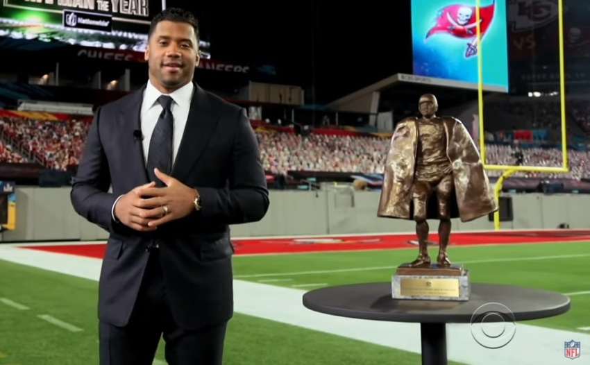 Russell Wilson gives an acceptance speech after winning the Walter Payton NFL Man of the Year Award in Tampa Bay, Florida on Feb. 6, 2020.