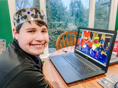 A Night to Shine participant takes part in Waterfront DC's virtual prom.