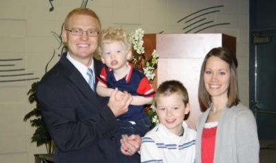 Canadian Pastor James Coates and his wife Erin with their family in an undated photo.