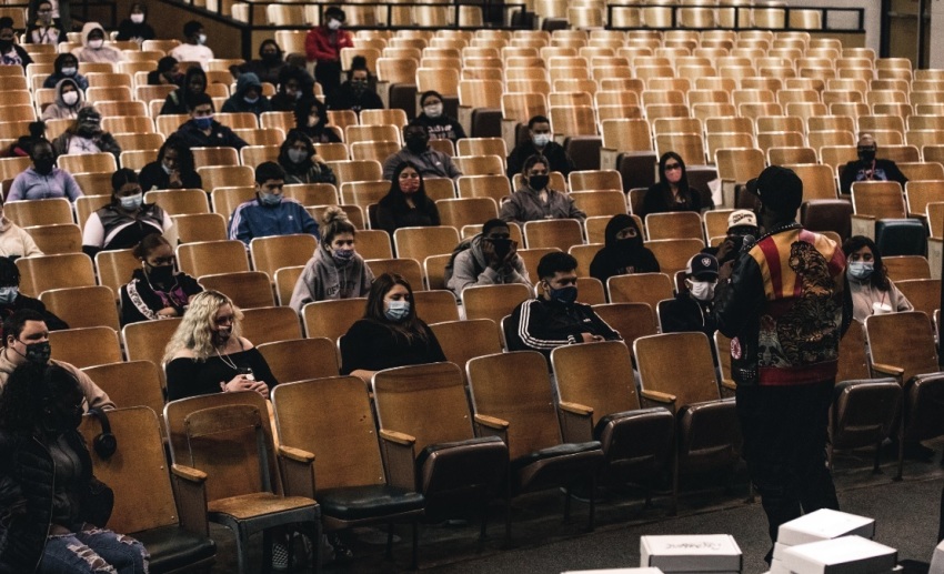 Transformation Church Lead Pastor Michael Todd speaks to a group of high school students on March 22, 2021. Later in the event, he gave out 221 laptops to students and staff.