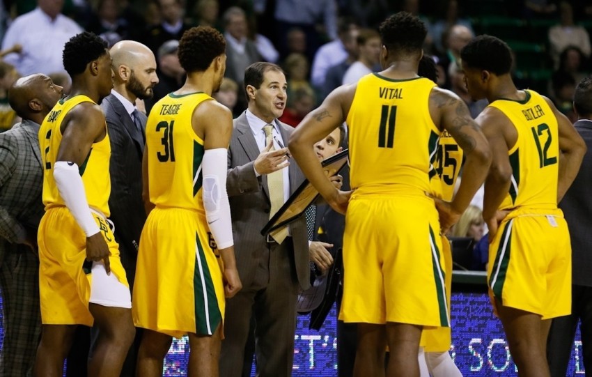 Baylor University men's basketball coach Scott Drew speaks with players during a timeout. The Baylor men's basketball program won its first NCAA championship on April 5, 2021.