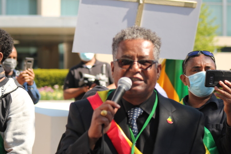 Shimelis Legesse, task force chairman for the Voice of the Voiceless Ethiopians, speaks at a protest in front of the U.S. State Department, April 20, 2021.