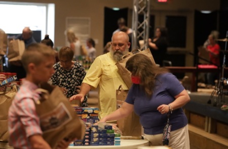 Wesley United Methodist Church of Evans, Georgia donates over 8,000 pounds of food and $10,000 to a ministry overseen by Macedonia Church of Grovetown in 2021.