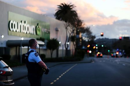 Police guard the area around Countdown LynnMall after a violent extremist stabbed six people before he was shot by police on Sept. 3, 2021 in Auckland, New Zealand.
