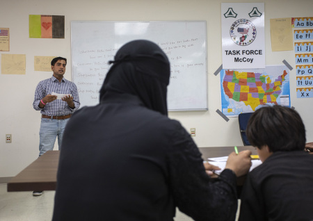 Afghan refugees take an educational class at Ft. McCoy U.S. Army base on September 30, 2021, in Ft. McCoy, Wisconsin. There are approximately 12,600 Afghan refugees being cared for at the base under Operation Allies Welcome. The Department of Defense, through U.S. Northern Command and U.S. Army North, and in support of the Department of Homeland Security, is providing transportation, temporary housing, medical screening and general support for at least 50,000 Afghan evacuees at suitable facilities in permanent or temporary structures while the Afghans complete the processing necessary to resettle in the United States.