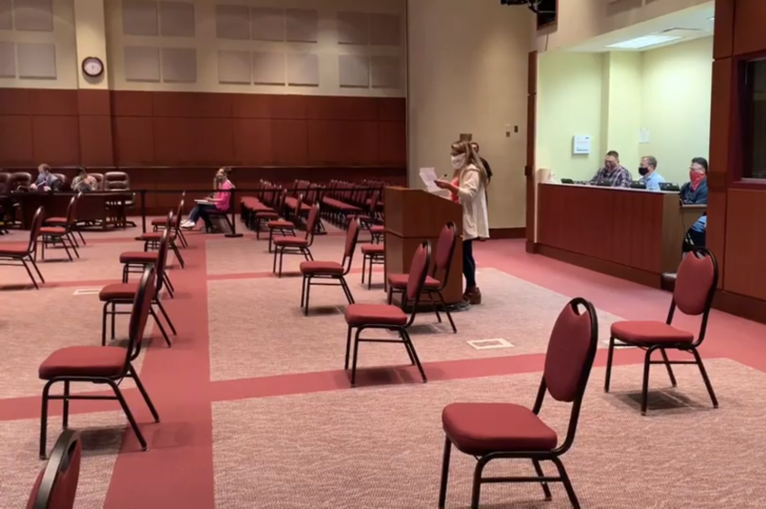 A parent speaks at a Loudoun County School Board meeting in Virginia on in October 2021 to demand the resignation of Superintendent Scott Ziegler.