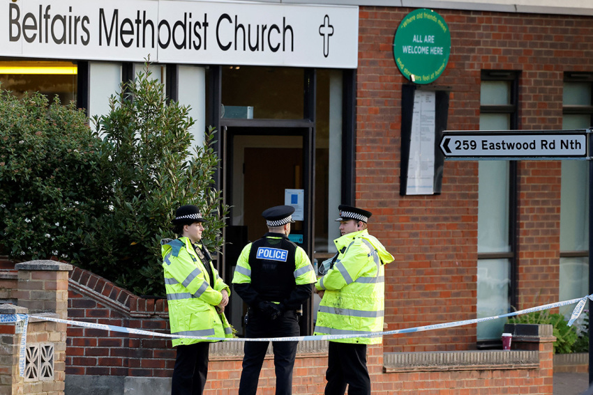 Police officers stand guard at the scene of the fatal stabbing of Conservative British lawmaker David Amess, at Belfairs Methodist Church in Leigh-on-Sea, a district of Southend-on-Sea, in southeast England on October 16, 2021. - The fatal stabbing of British lawmaker David Amess was a terrorist incident, police said Saturday, as MPs pressed for tougher security in the wake of the second killing of a U.K. politician while meeting constituents in just over five years.