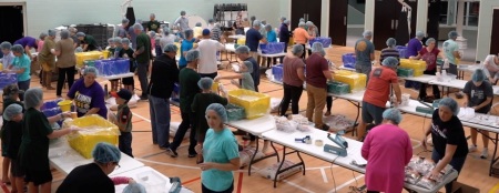 Volunteers with Unity Church of Greenville, North Carolina, a Free Will Baptist congregation, packing 50,000 meals for those in need in Zambia on Oct. 29-30, 2021.