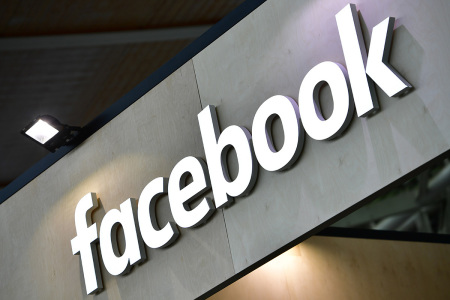 The Facebook logo is displayed at the 2018 CeBIT technology trade fair on June 12, 2018, in Hanover, Germany.