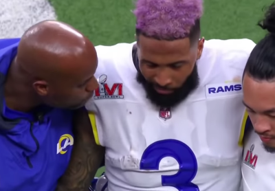 Odell Beckham Jr. is helped off the field after suffering a knee injury during Super Bowl LVI on Feb. 13, 2022, in Inglewood, California.