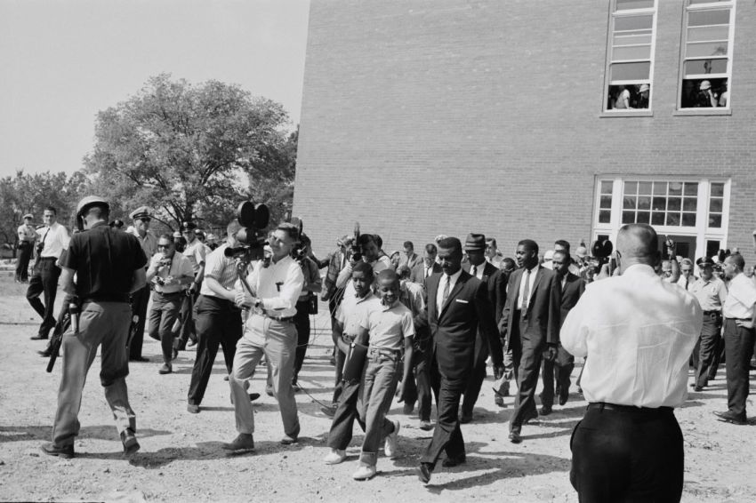 Schoolboys Dwight and Floyd Armstrong arrive at Graymont Elementary School in Birmingham, Alabama, on the first day of desegregation of schools in the city, 4th September 1963. They are accompanied by their father James Armstrong, civil rights campaigner Fred Shuttlesworth and lawyer Oscar Adams.