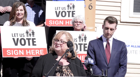 Nebraska Family Alliance Executive Director Karen Bowling (center) speaks during a press conference in Lincoln, Nebraska, on March 1, 2022.