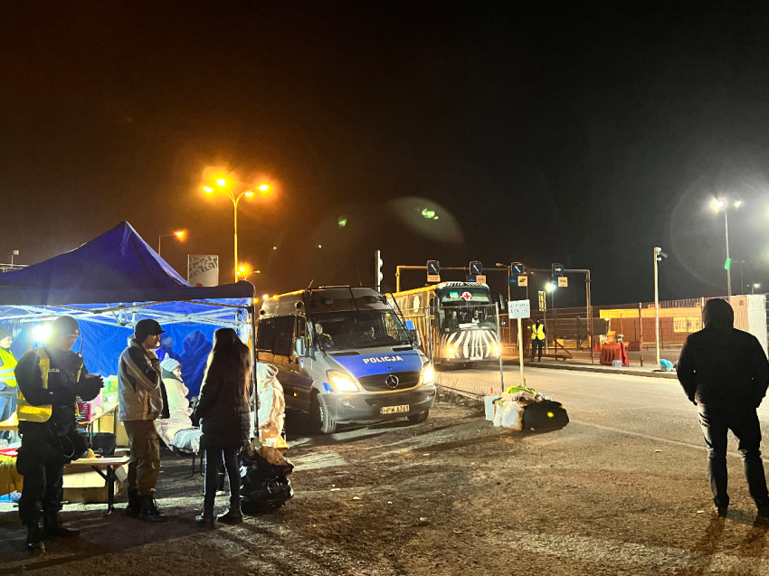 A bus drives across the border from Ukraine into Poland in March 2022.