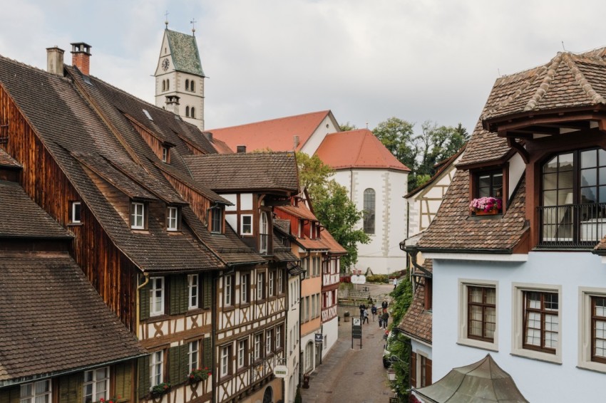 People walk on the picture-perfect streets of Meersburg, Germany.