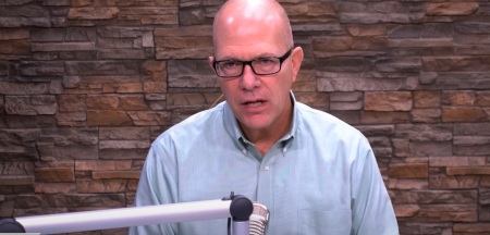 Dan Celia, former CEO and president of Financial Issues Stewardship Ministries, answers financial questions as part of a broadcast in 2015. 