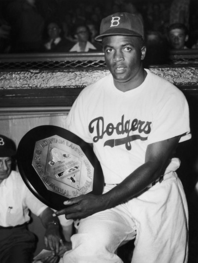 Jackie Robinson with his National League's Most Valuable Player award from the baseball writers asscoiation, July 1950. He is only the fourth Brooklyn Dodgers player to win the award.