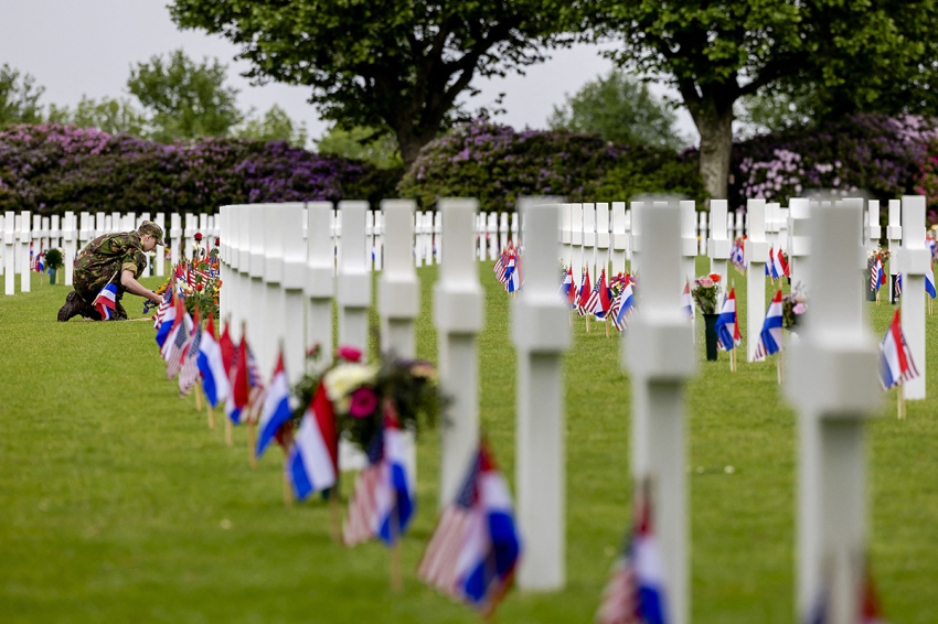 A soldier checks the last details of preparations of the cemetery before the annual Memorial Day commemoration at the Netherlands American Cemetery in Margraten where over 8,200 American soldiers are buried, May 29, 2022.