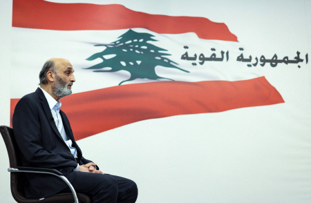 Samir Geagea, leader of the Christian Lebanese Forces party, speaks to an AFP journalist during an interview at his residence in Maarab, north of the capital Beirut, on May 20, 2022.