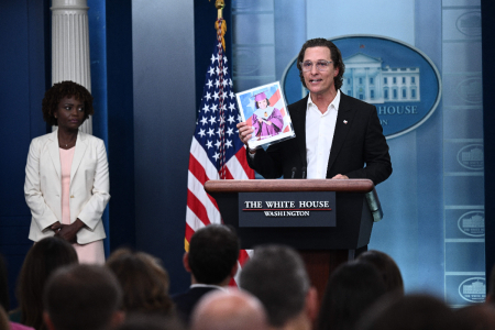 Actor Matthew McConaughey holds a photo of Alithia Ramirez, a 10-year-old student who was killed in the mass shooting at Robb Elementary School, while speaking during the daily briefing in the James S. Brady Press Briefing Room of the White House in Washington, D.C., on June 7, 2022.